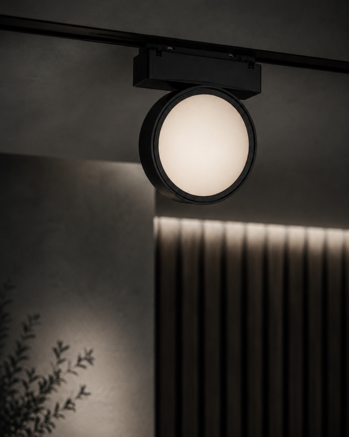 Round opal track light casting a soft diffuse glow
